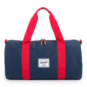 Sutton Mid Volume Duffle Bag in Navy and Red by Herschel Supply Co.  - 2