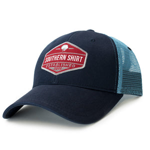 The Southern Shirt Co. Trademark Badge Mesh Back Trucker Hat in Twilight and Carolina Blue